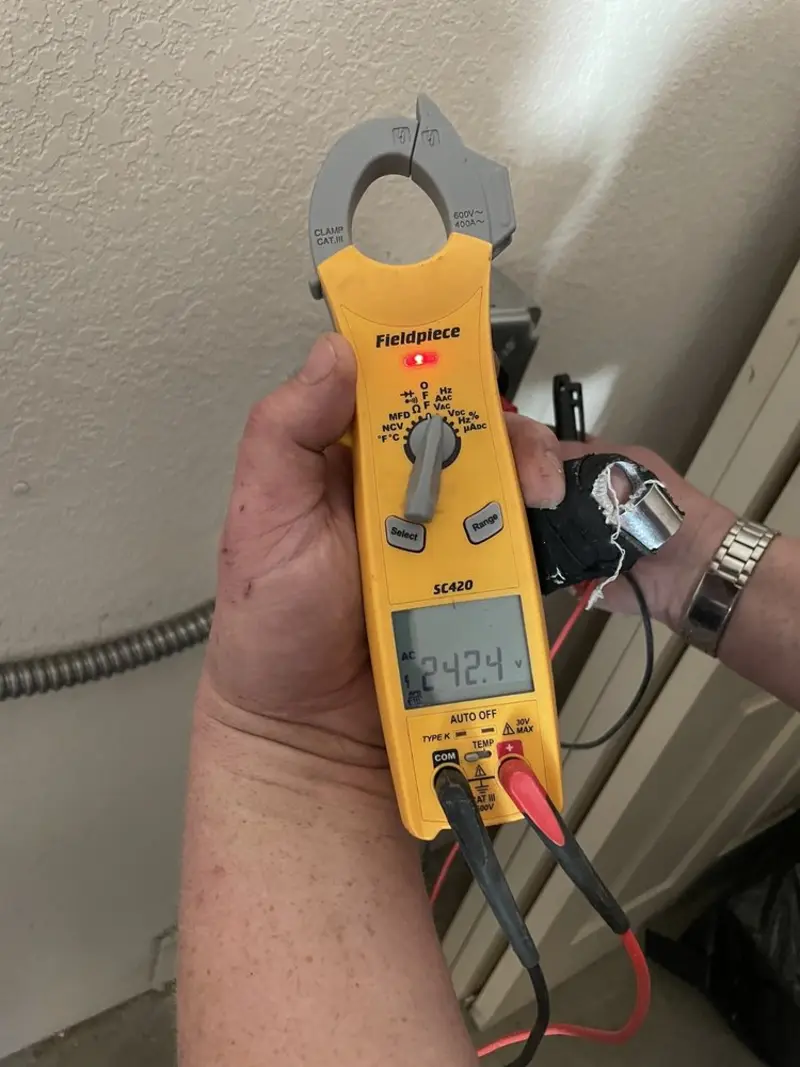 Voltage testing with clamp meter during Outlet Installation in Ellisburg